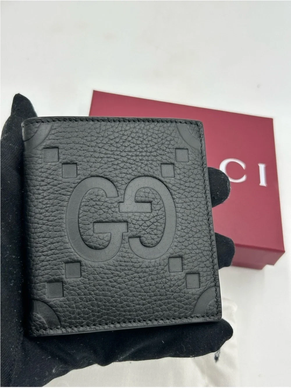Men’s Gucci, jumbo GG leather bifold wallet made in Italy